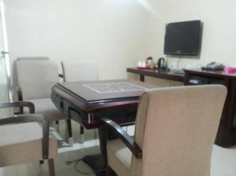 אורומקי Xinhang Hotel מראה חיצוני תמונה